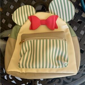 Disney Minnie backpack
 unnoticeable highlighter mark on back *see pic*